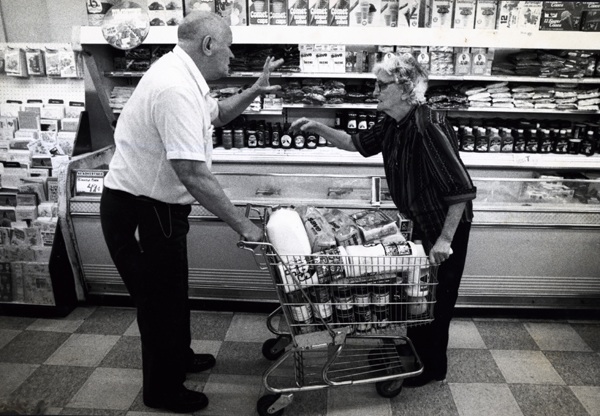 Grocery shopping can include some very animated discussions. (Copyright by John S. Stewart/LEFTeyeSTORIES.com)
