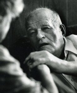 Teddy reads Nora's hand signing by feeling the signs in his hand. (Copyright by John S. Stewart/LEFTeyeSTORIES.com)